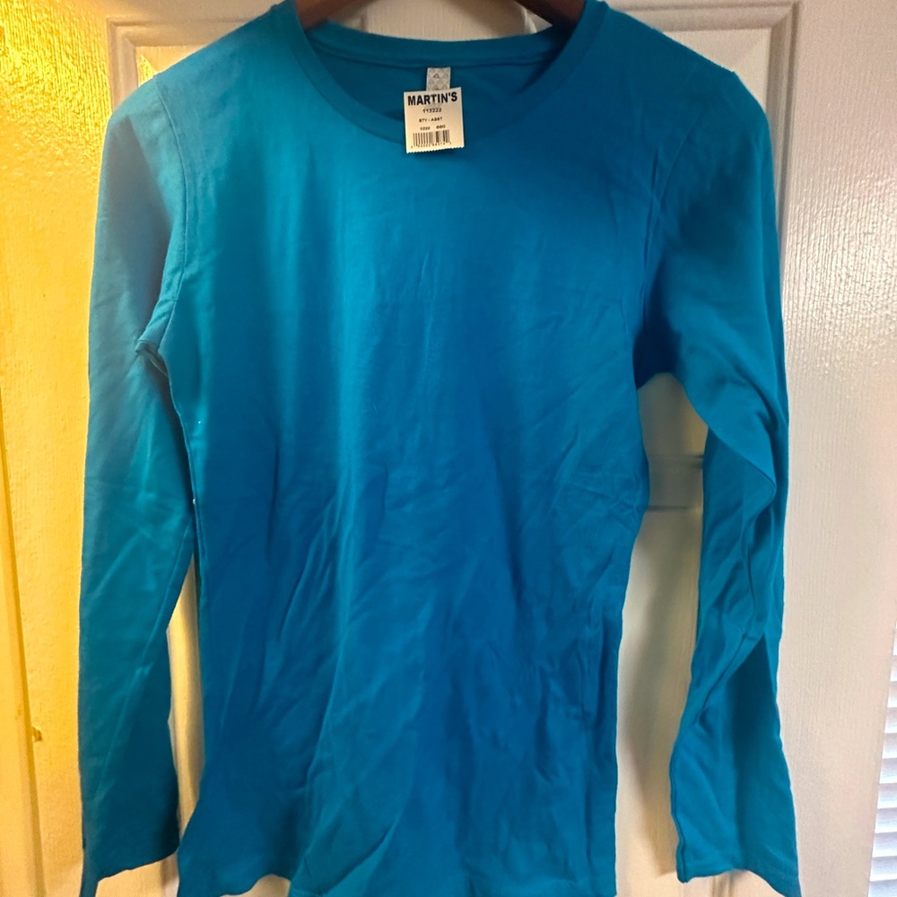 Never worn long sleeve shirt